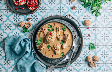 Satsivi is a cold Georgian dish made from boiled chicken pieces and walnut sauce.