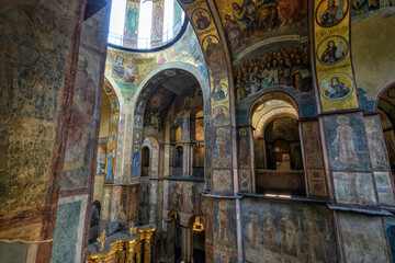 Interior of the St. Sophia Cathedral with mosaic, painting frescoes on the wall and the golden...