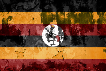 uganda flag in cracks. background, wallpaper