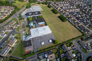 aerial view of St Andrews Primary School, urban housing estate and community. Sutton Park , to the...