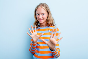 Caucasian teen girl isolated on blue background rejecting someone showing a gesture of disgust.