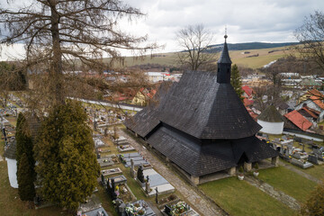 Fototapeta na wymiar Aerial view of wooden articular church of All Saints from the mid-15th century, Tvrdosin, Slovakia. UNESCO world heritage site