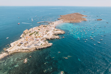Aerial view of Tabarca island with boats at anchor. Mediterranean Sea. Popular travel destinations...