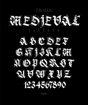 Gothic.  Uppercase and lowercase white letters on a black background. Beautiful and stylish calligraphy. Elegant European typeface for tattoo and design. Medieval Germanic modern style.