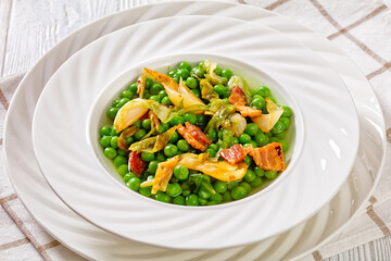 petits pois, french dish of garden green peas