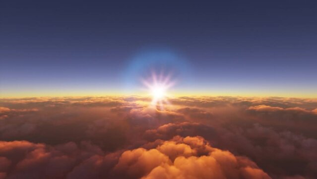 Flying above the clouds at sunset. aerial view of the sky with a lens flare