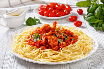 Shrimp alla Marinara with pasta on plate