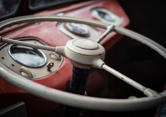 Dashboard and steering wheel of old-timer car