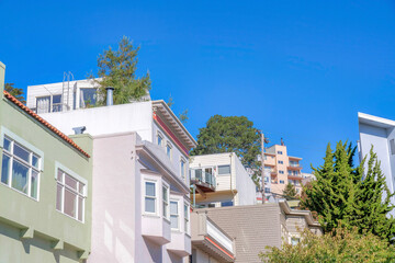 Adjacent houses on a sloped neighborhood at San Francisco, California
