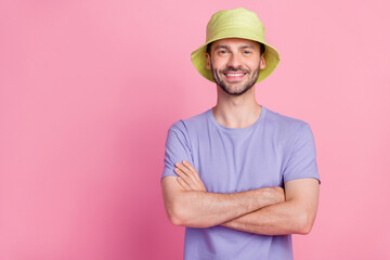 Photo of cool positive good mood boy wear violet outfit clothes trendy sunhat panama stand empty space isolated on pink color background