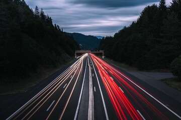 Long exposure of cars on a freeway at dusk in Carinthia, Austria