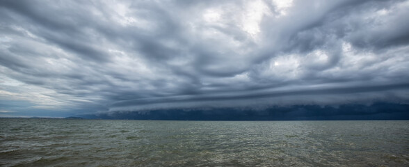 Cloudy storm in the sea before rainy. Tornado storms cloud above the sea. Monsoon season. Huge...