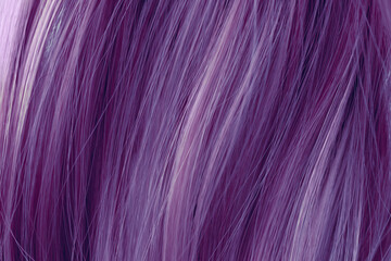 Purple curly hair texture closeup. Toned purple  hair background.