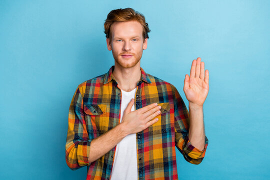 Photo Of Kind Thankful Person With Ginger Hairstyle Dressed Plaid Stylish Shirt Hold One Hand On Heart Isolated On Blue Color Background