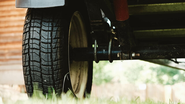 Wheel with a rubber tread from a car trailer