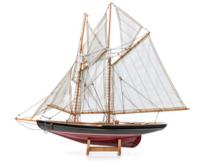 Model of wooden sailing ship on white background