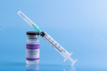 Vaccine bottle with Syringe on top of vaccine bottle for injection vaccine Covid-19 or Coronavirus