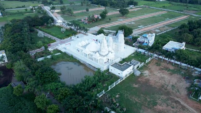 Tirupati, Sri Brahmrishi Ashram, India 8th August 2022: A drone shot of a beautiful Indian Hindu temple. Devi Devta. Indian Gods. Laxmi Narayan and Jain temple side by side. 