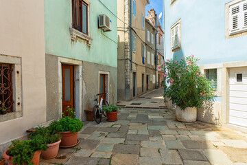 Fototapeta na wymiar street scene with old houses in the town of Cres, Island of Cres, Kvarner, Croatia.