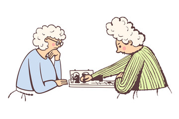 Two old ladies are playing chess.