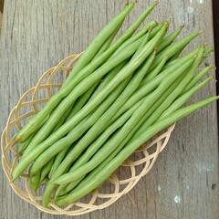 green beans on a wooden table