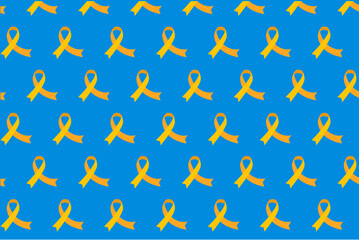 Yellow ribbon crossing breast cancer woman signing cancer fighting concept isolated from blue background.