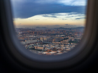 Fototapeta na wymiar city view from airplane window