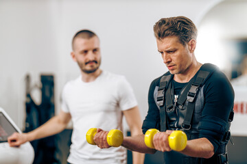 Man Doing EMS Workout In The Gym