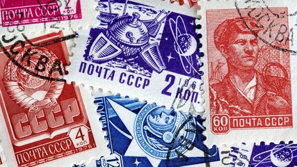 Stamps from the communist USSR from the 60s and 70s with some of them commemorating their progress in the space race with images of the moon probe (Mechta) and other - obrazy, fototapety, plakaty