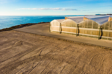 Aerial view. Commercial greenhouses on coast, Spain.