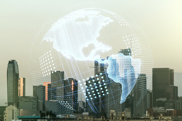 Double exposure of digital map of North America hologram on Los Angeles city skyscrapers background, research and strategy concept