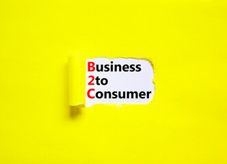 B2C business to consumer symbol. Concept words B2C business to consumer on white paper on a beautiful yellow background. Business and B2C business to consumer concept. Copy space.