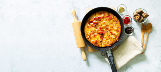 Top view of pizza,Traditional pizza with tuna and vegetables. Top view. free space for your text. Rustic style