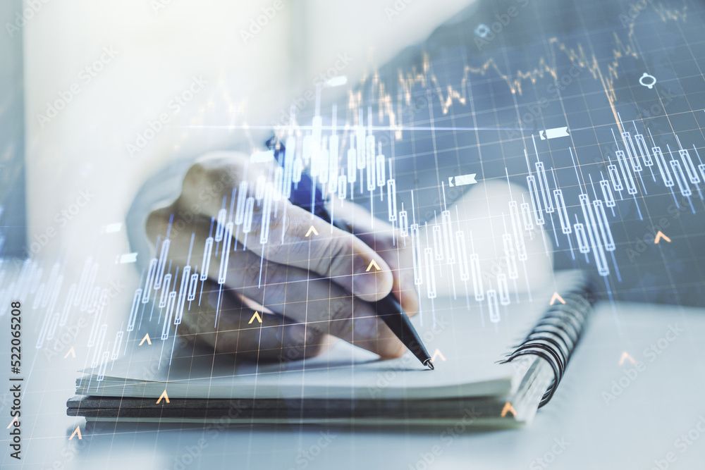 Poster multi exposure of abstract financial diagram with world map and with man hand writing in notepad on 