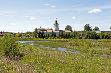 Church of St. Nicholas the Wonderworker on the bank of the pond. Nizhny Tagil. Sverdlovsk region. Russia - obrazy, fototapety, plakaty