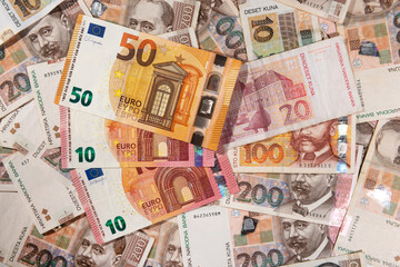 Euro and Kuna banknotes. Croatia adopts Euro currency in January 1 2023.