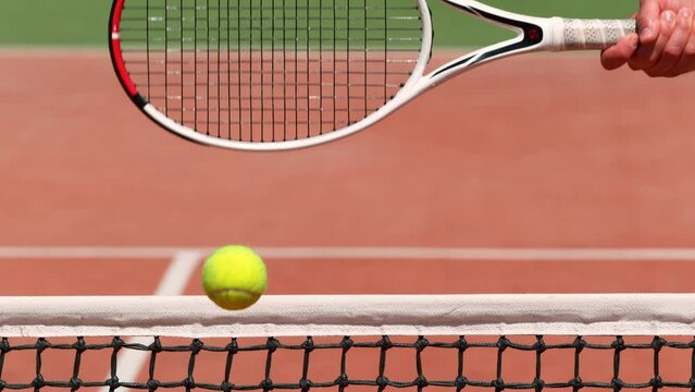 Super Slow Motion Shot of Tennis Hit Over the Net at 1000fps.