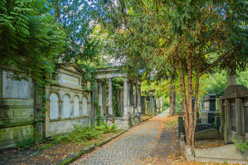Fototapeta na wymiar Decorative historic family tombs in the old Jewish cemetery in Wrocław.