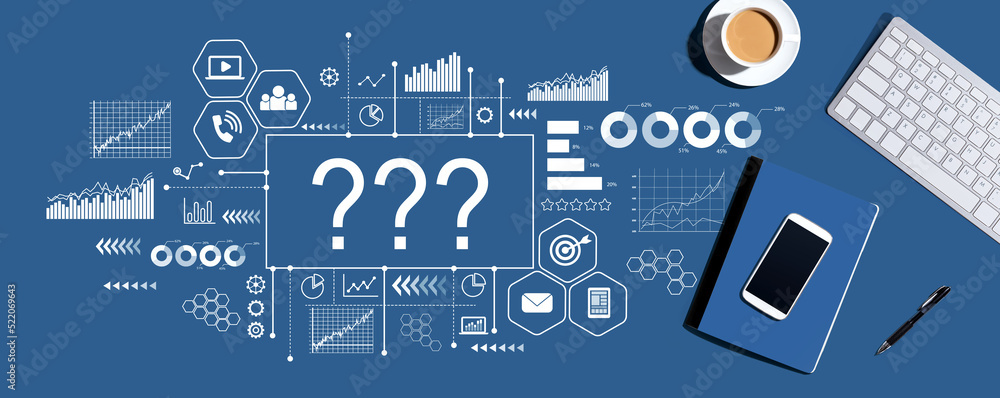 Aufkleber question marks with a computer keyboard and office items