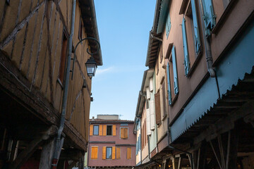 Old framework houses at main square of medieval village Mirepoix in southern France