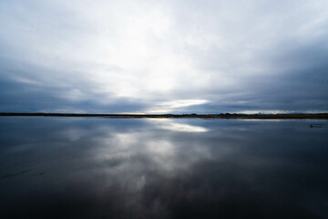 beach with great reflection and mountains