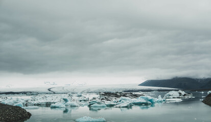 lake Jökulsárlón glacier against mountains
