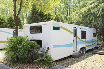 Summer journey to campground in forest. Leisure and relaxation with family or friends during weekends or holidays