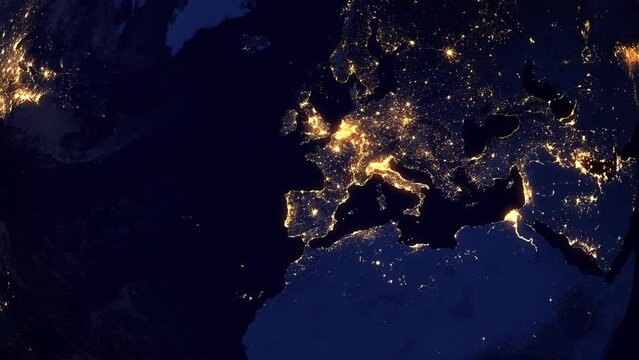 Animation of Rotating Earth From Europe to North America at night. Earth Seen from Space With City Lights Showing Human Activity. Satellite View.

