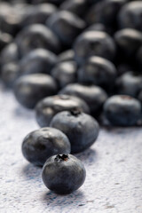 Macro close up of unwashed blueberries.