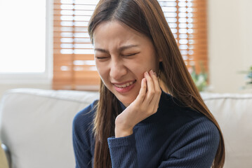 Asian women have gum problems and toothache
