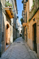 Fototapeta na wymiar A narrow street in Sant'Agata de 'Goti, a medieval village in the province of Benevento in Campania, Italy.
