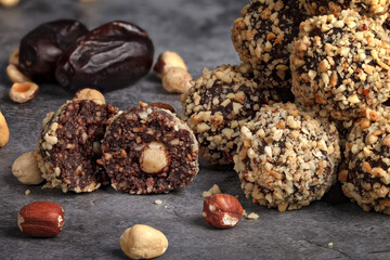 Homemade candy with grated almond nuts and dates