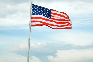American Flag Wave CloseUp in blue sky background, United States Of America Flat Flags