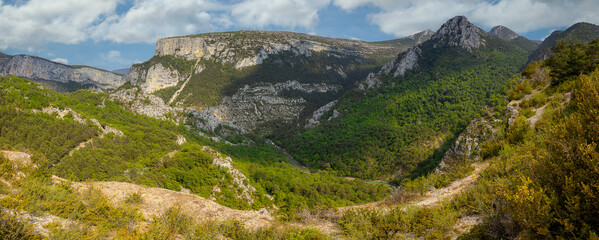The Verdon Gorge (French: Gorges du Verdon) is a river canyon located in the Provence-Alpes-Côte...